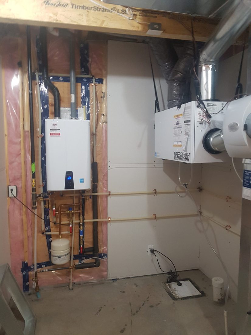 Gas-fired on-demand water heater with neatly run supply lines
